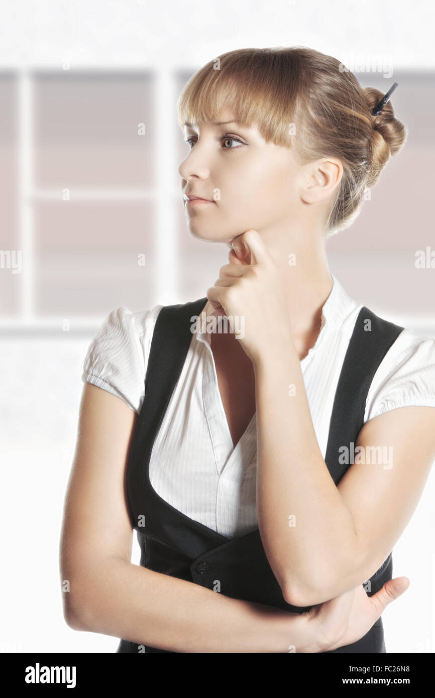 Young caucasian woman looking sideways Stock Photo