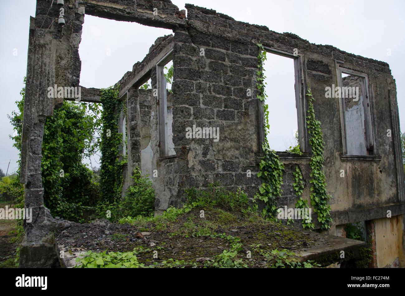 War torn village. Abkhazia. Destroyed building. Stock Photo