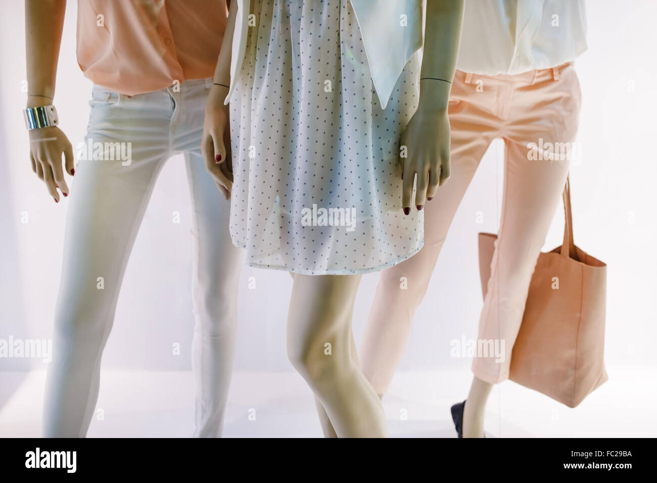 Fashion concept. Photo of elegant female legs mannequins showing