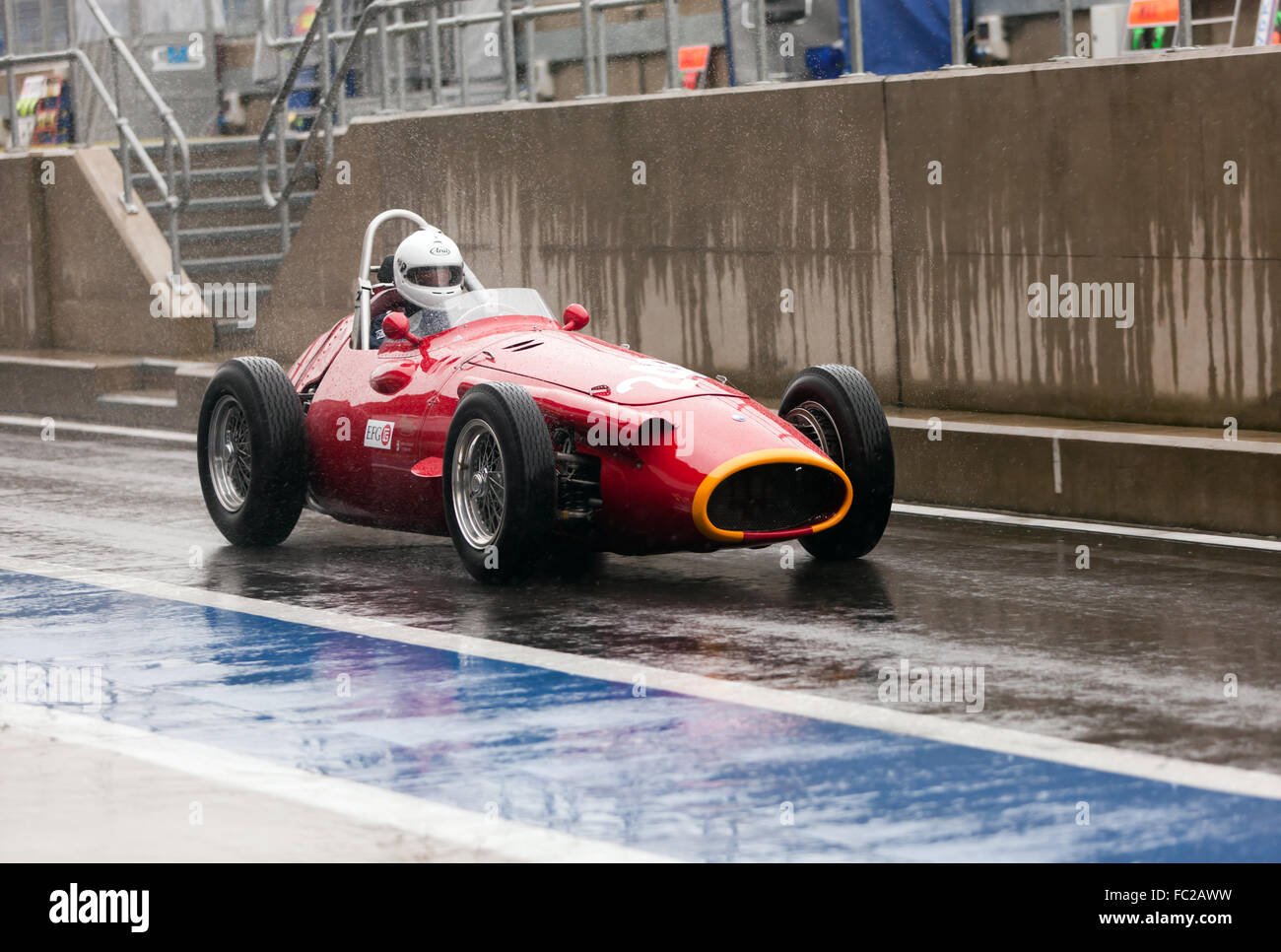 A Maserati 250F Grand Prix Car Qualifying in the rain, for the Maserati Trophy for HGPCA Pre '66 Grand Prix Cars race. Stock Photo