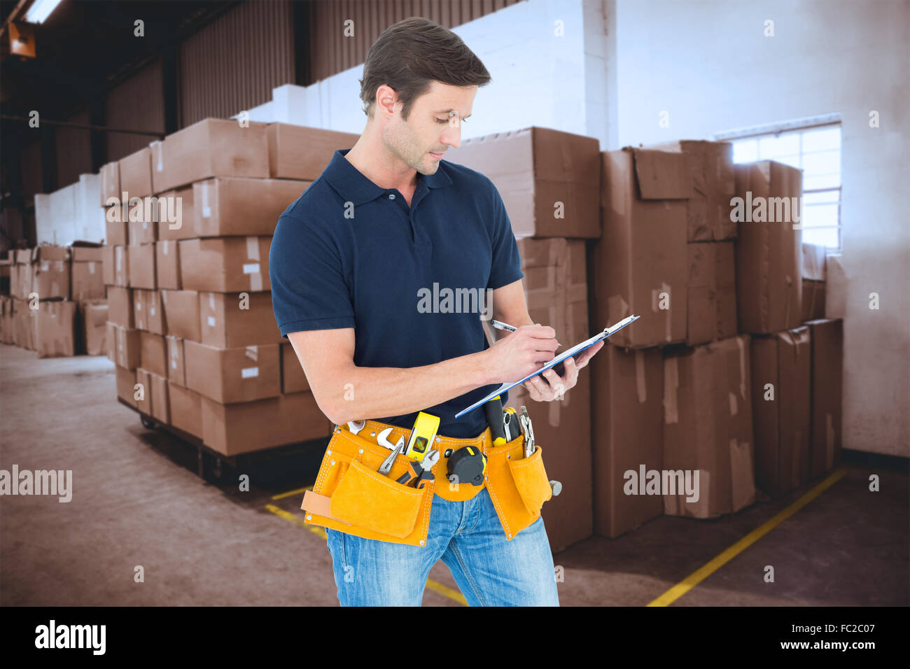 Composite image of carpenter writing on clipboard over white background ...