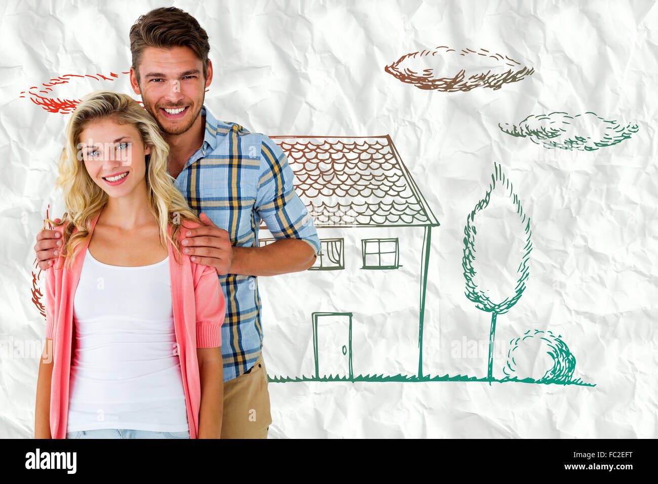 Composite image of attractive young couple smiling at camera Stock ...