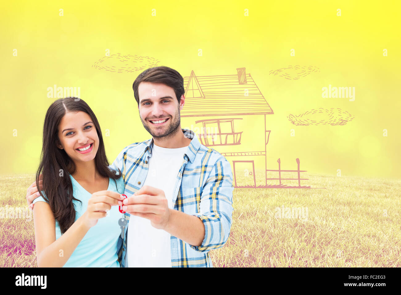 Composite image of happy young couple showing new house key Stock Photo ...