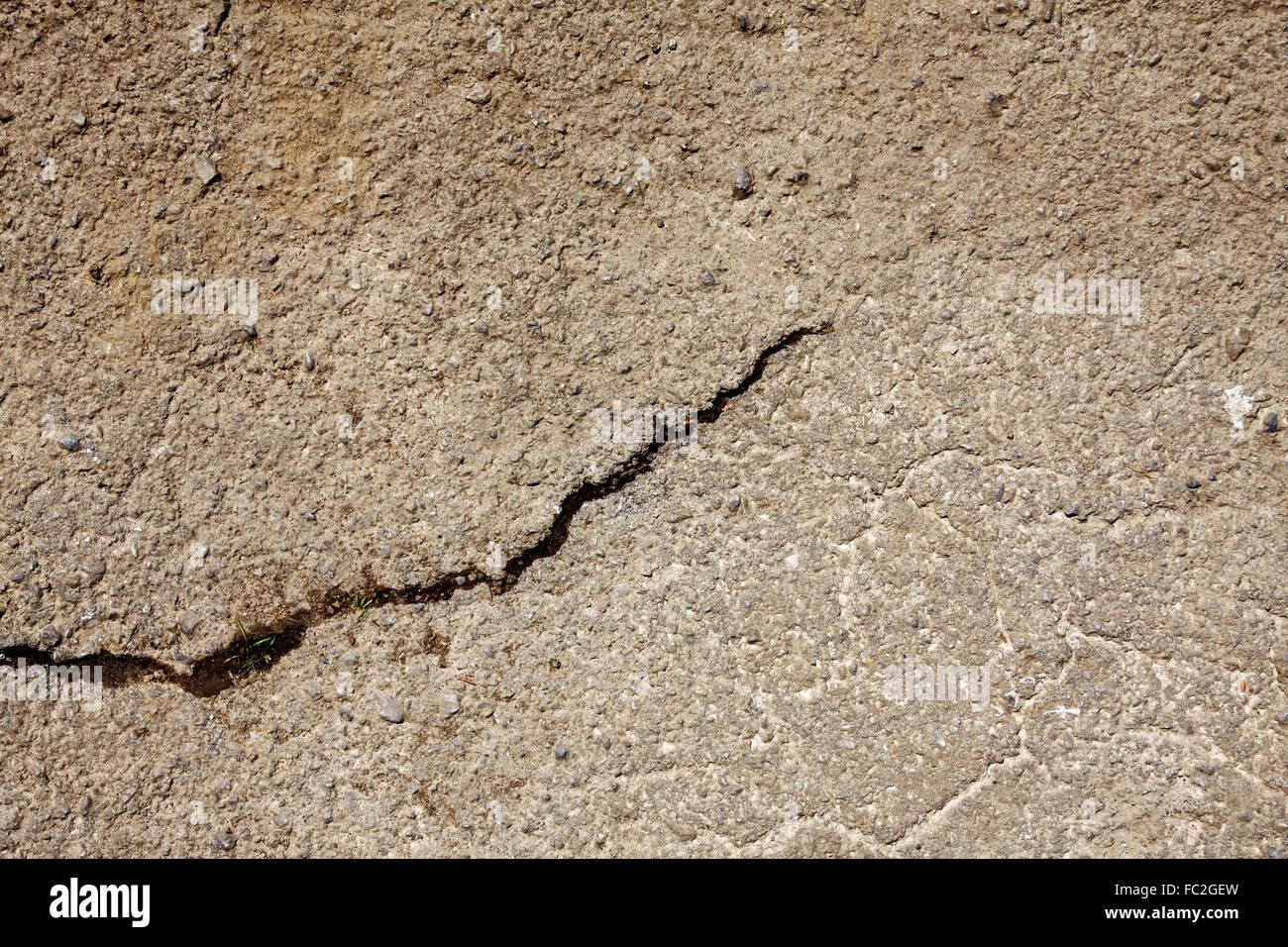 Cracked concrete path Stock Photo Alamy