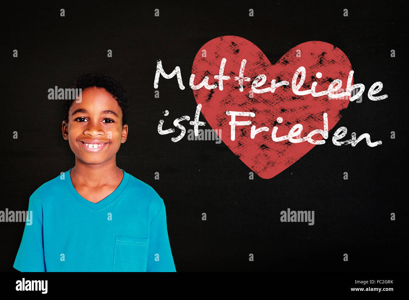 Composite image of cute boy smiling at camera Stock Photo - Alamy
