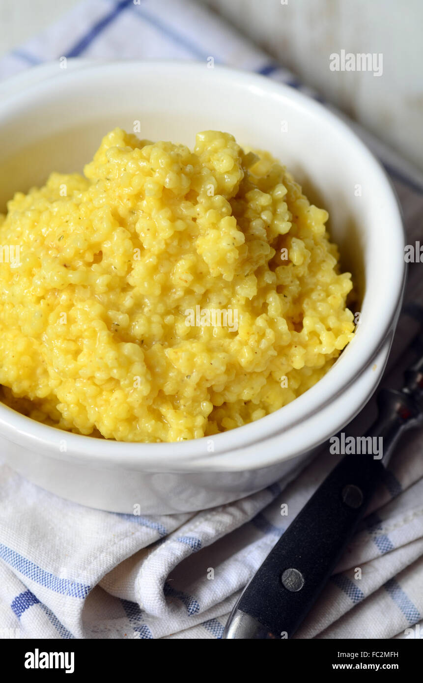 Freshly cooked millet porridge in a ceramic pot Stock Photo Alamy