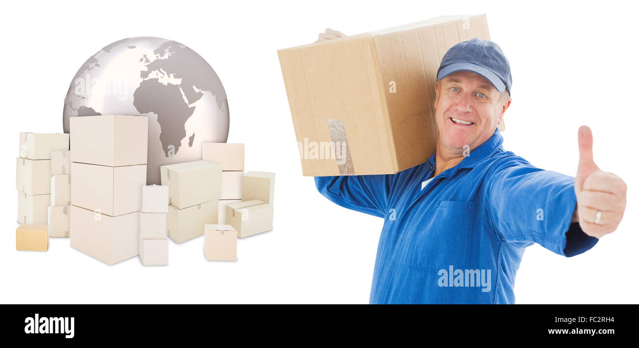Composite image of happy delivery man holding cardboard box Stock Photo
