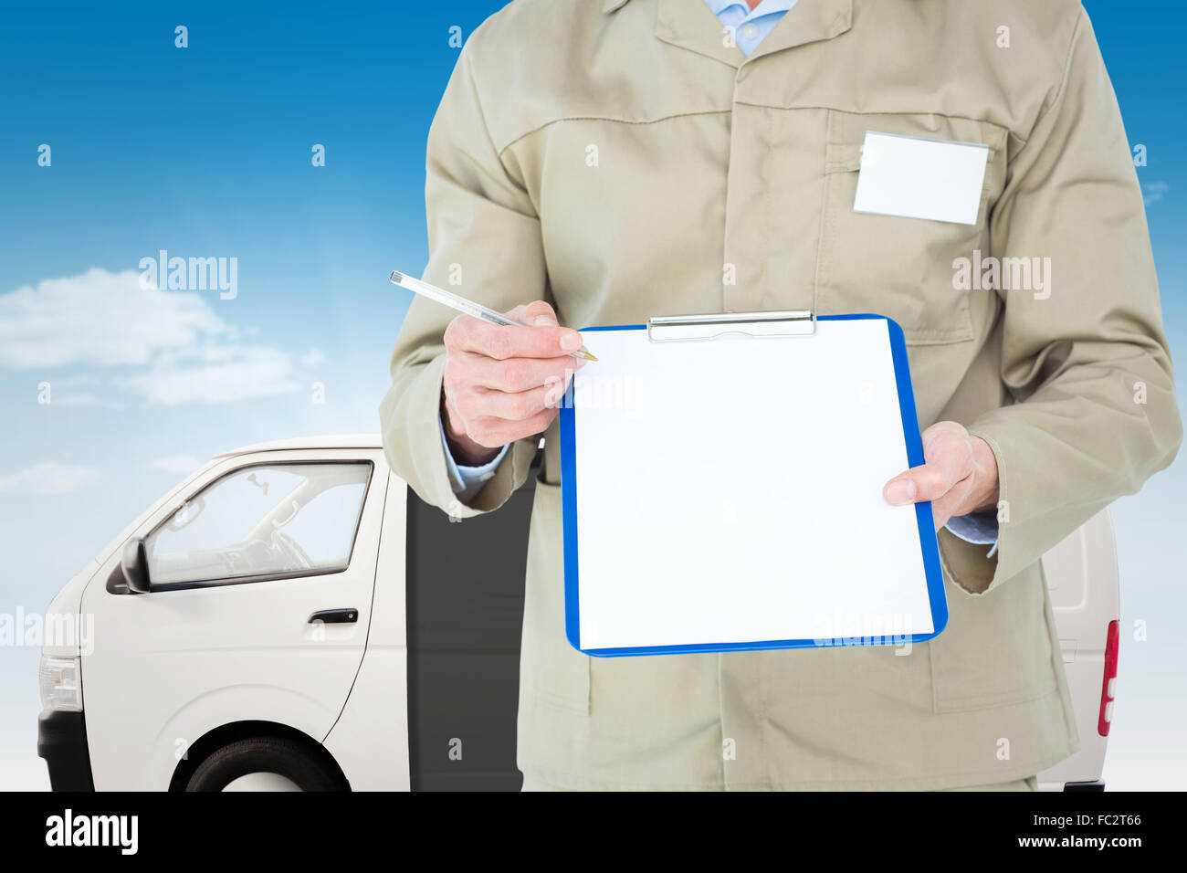 Composite image of delivery man showing blank paper on clipboard Stock Photo