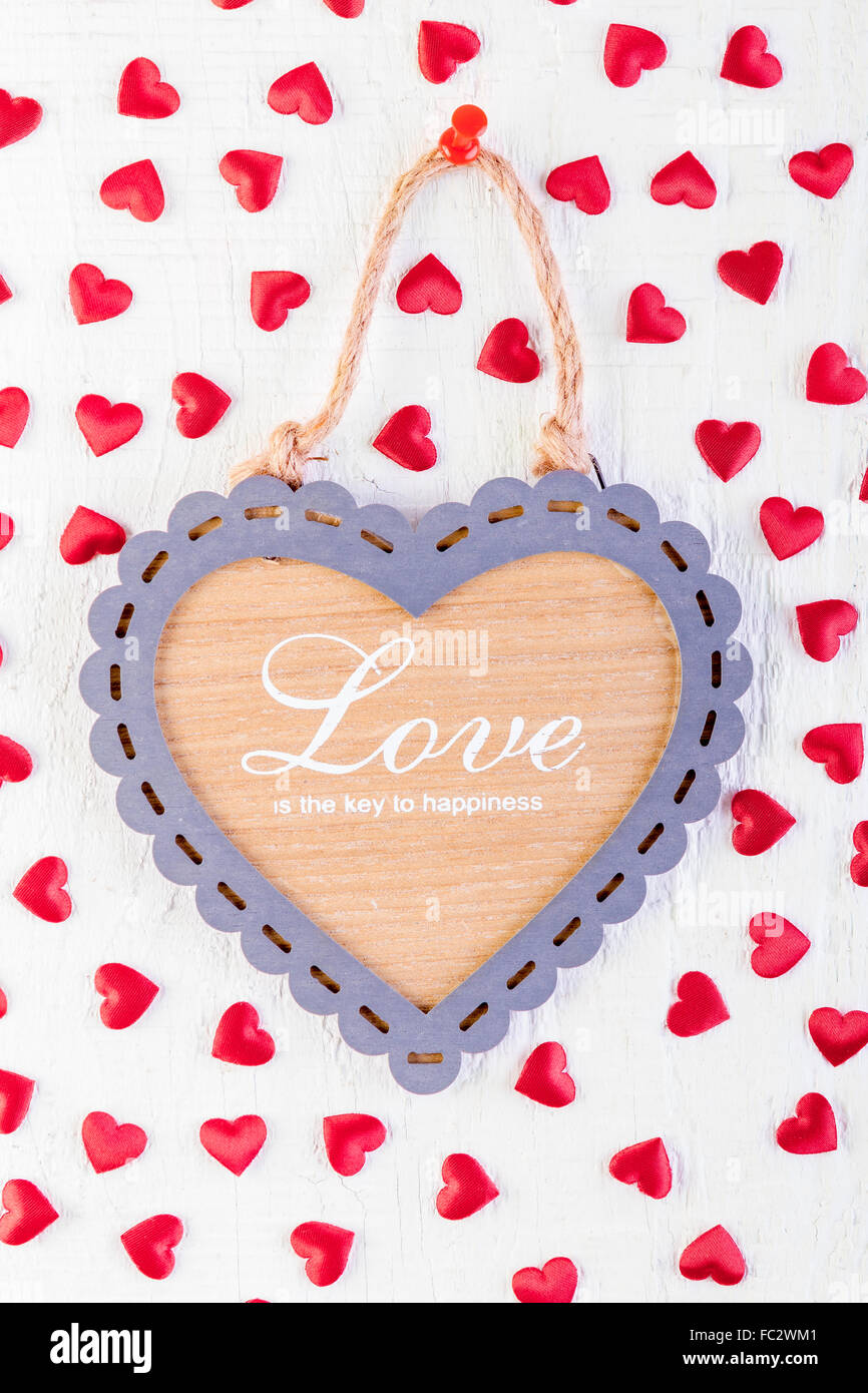 Love heart on wooden texture background, Valentines day card concept. Stock Photo