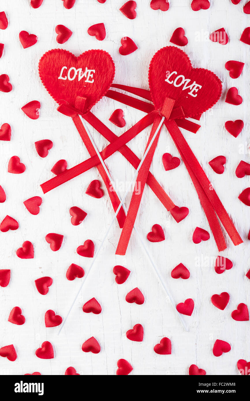 Love hearts on wooden texture background, Valentines day card concept. Stock Photo
