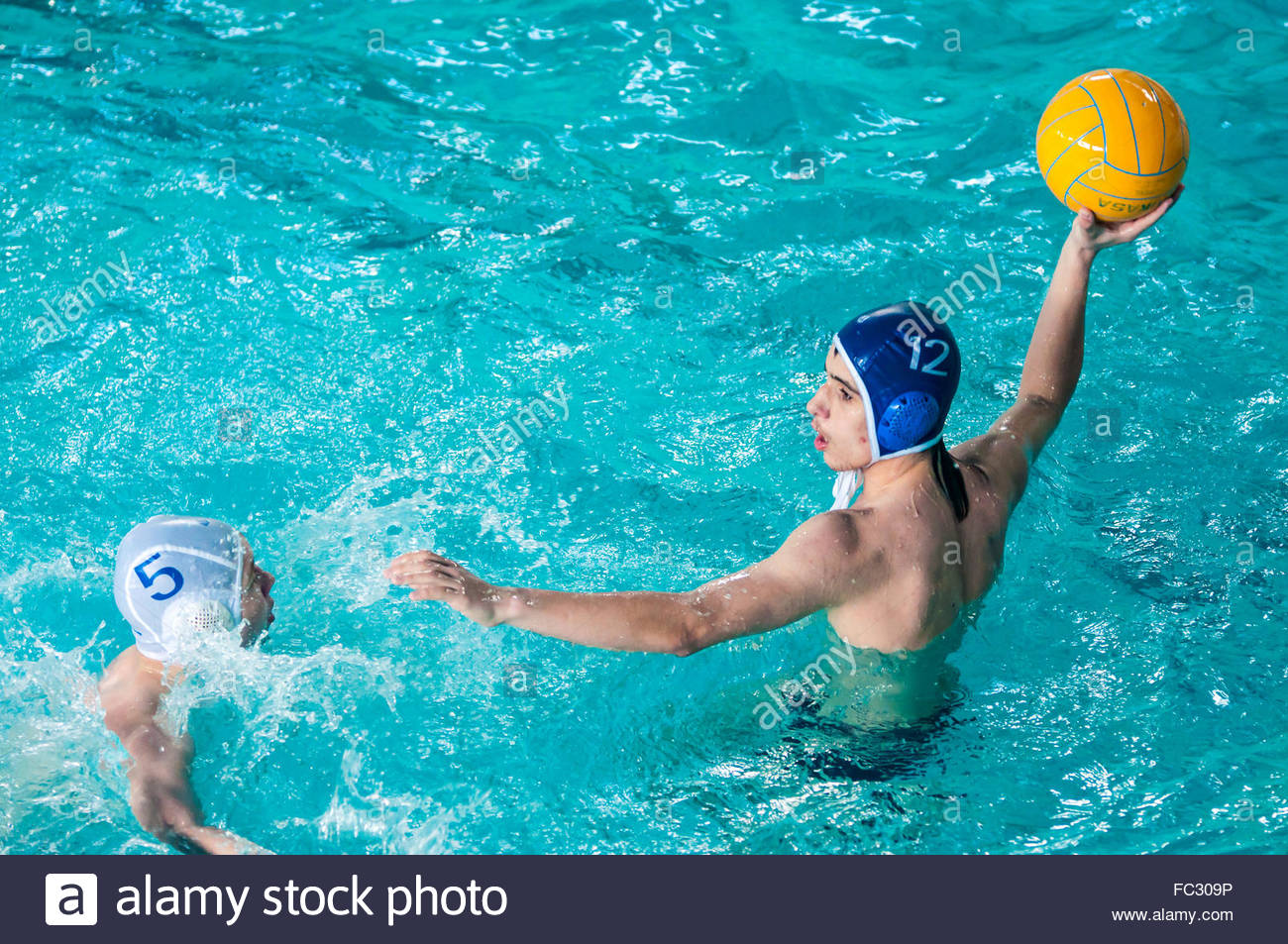 Water Polo Ball Underwater Stock Photos & Water Polo Ball Underwater