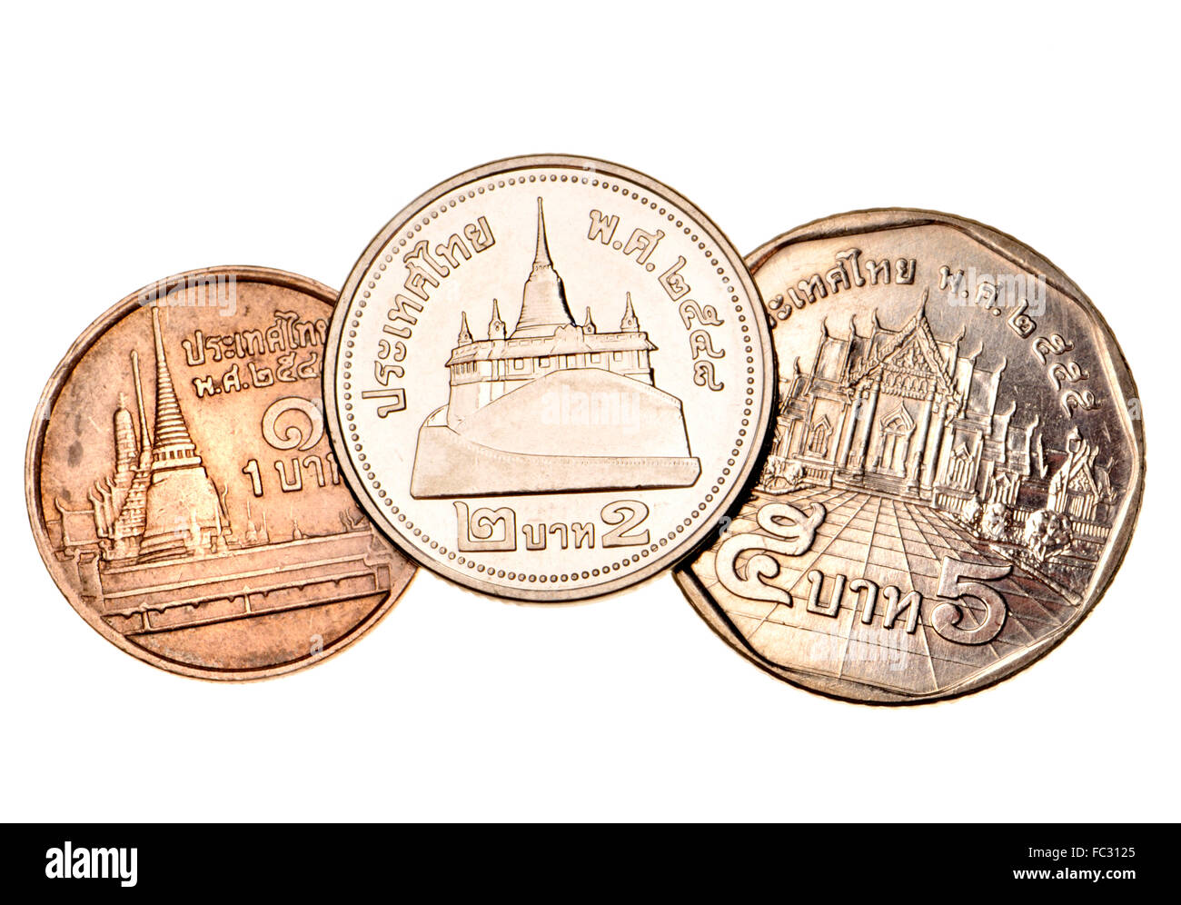 Thai 1, 2 and 5 Baht coins showing Wat Phra Kaew (1); the Golden Mount (2); and Wat Benjamabophit (5) Stock Photo