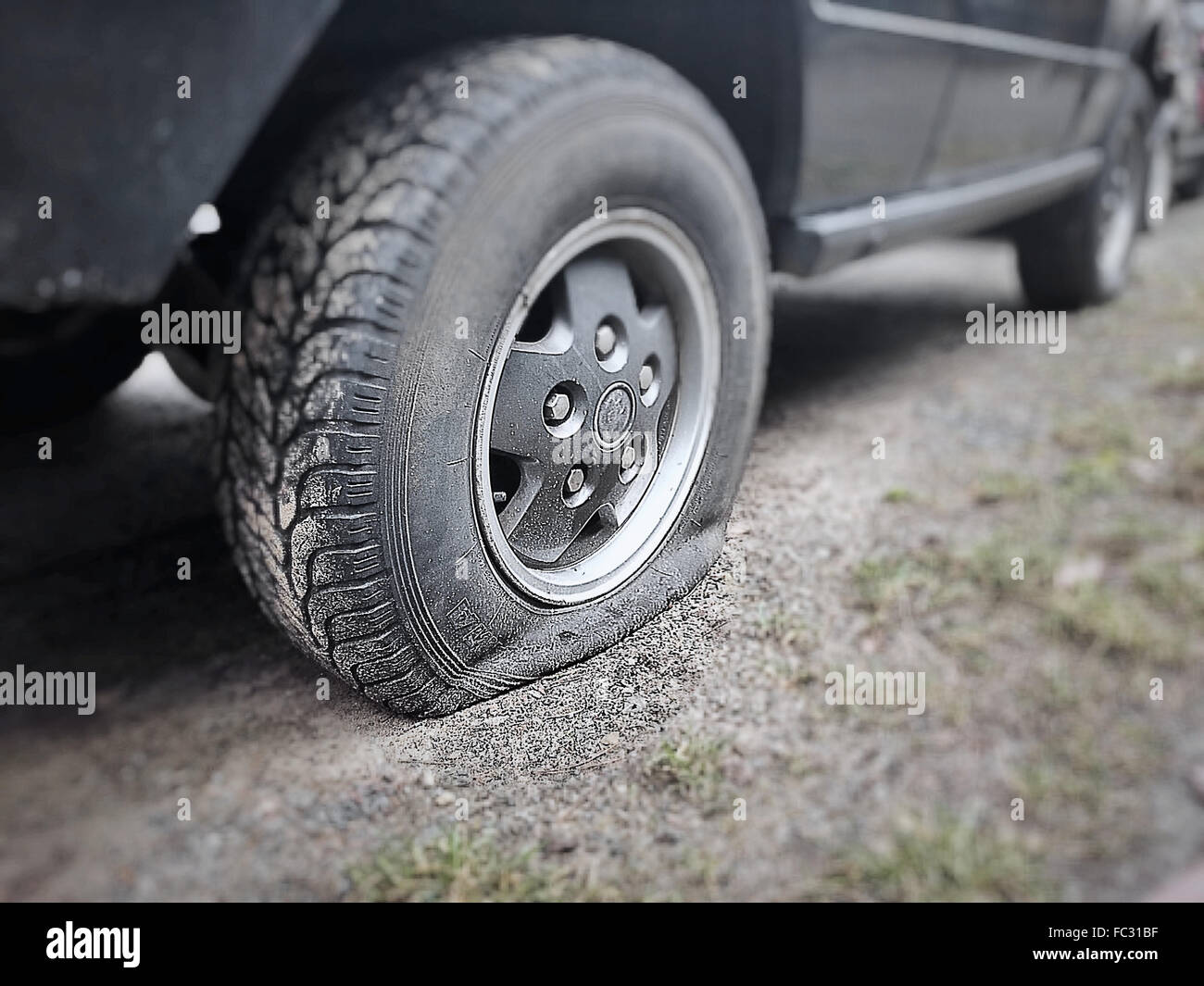 Flat tyre mechanic hires stock photography and images Alamy