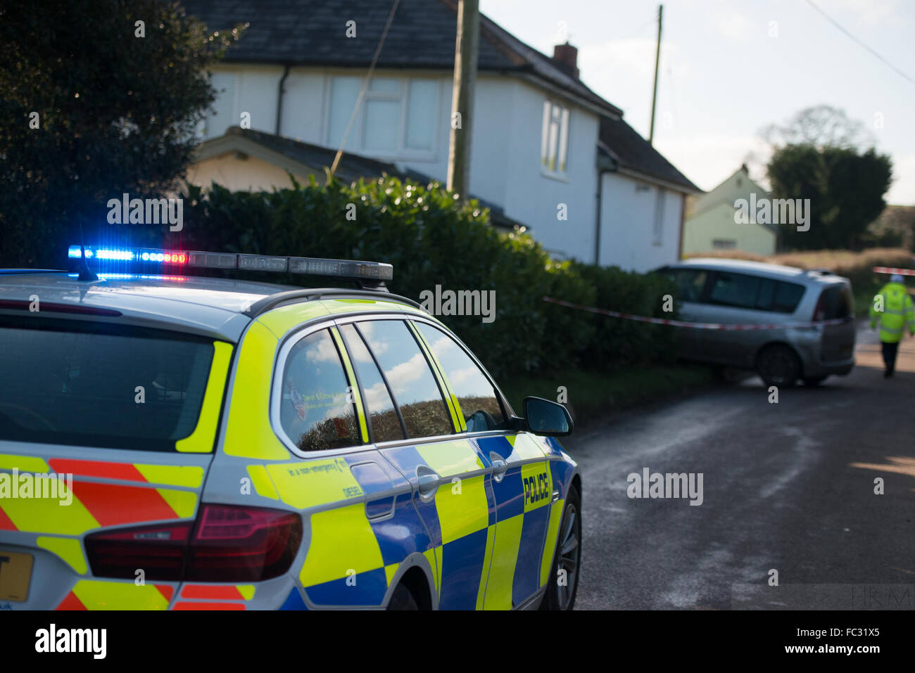 Ottery St Mary, Devon, UK. 20th January, 2016. Icy winter weather - causes dramatic vehicle collison - Near Ottery St mary, East Devon, UK.  Car Crashes into House - Fluxon, Ottery St Mary, Devon.    A Renault Scenic has come of the road at Fluxton, nr Ottery St Mary ,East Devon this morning, and crashed into the side of Apple cottage. Credit:  camerafirm/Alamy Live News Stock Photo