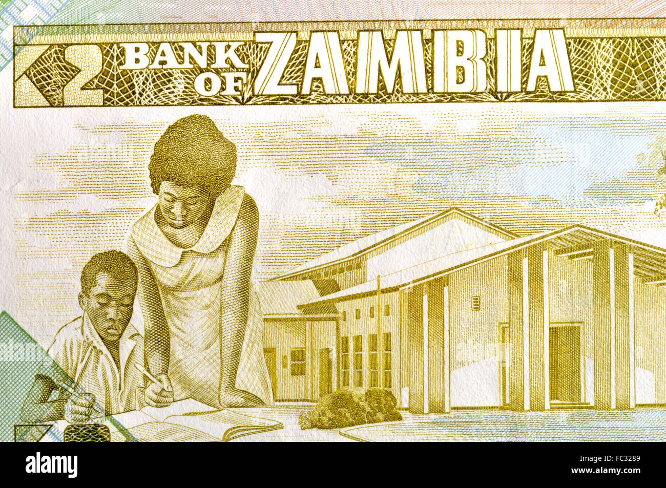 Zambian two Kwacha banknote of 1987 - detail showing a school, teacher and student Stock Photo