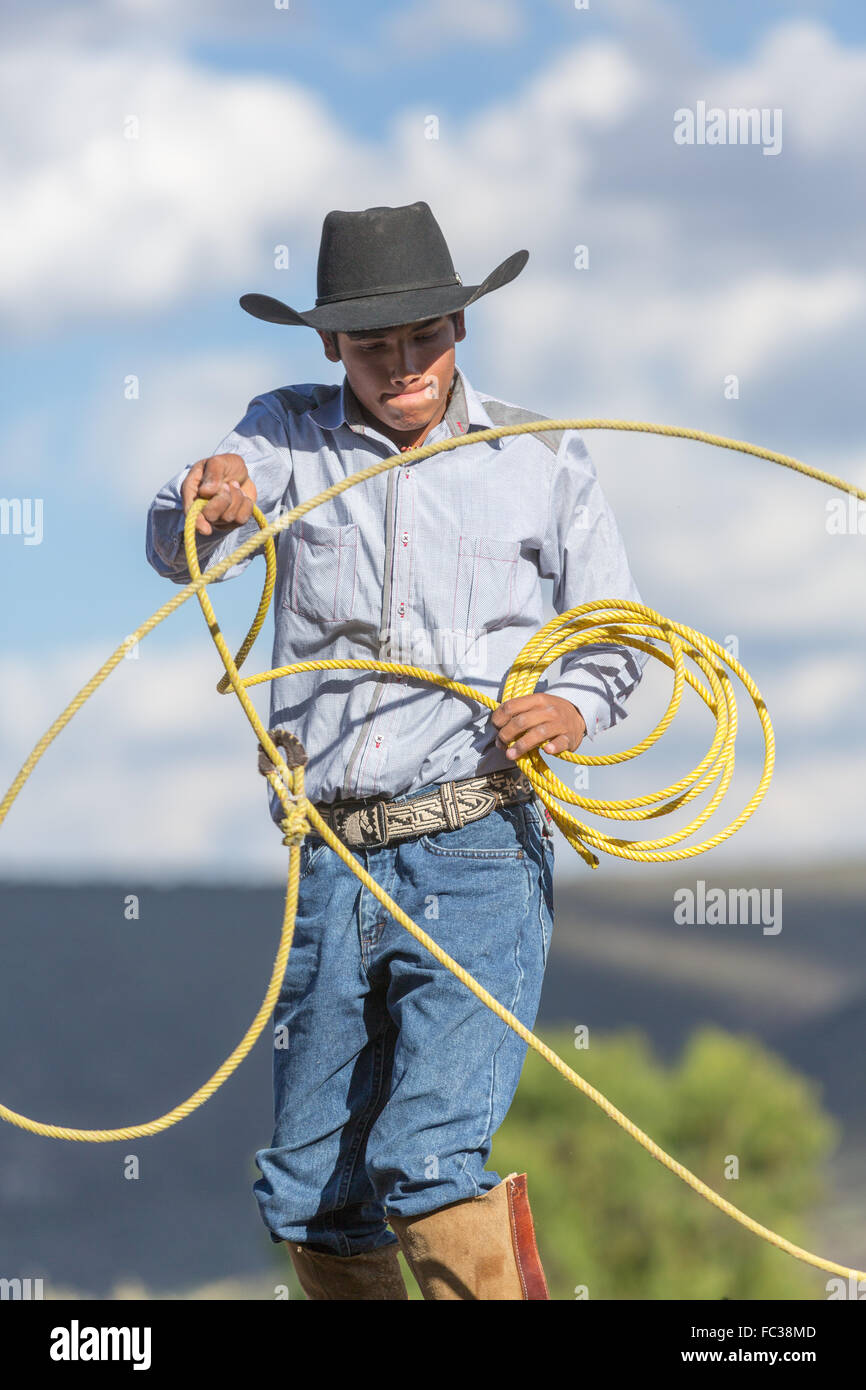 Charro Rodeo Ropes A Mexican charro or cowboy practices roping skills standing on his ...