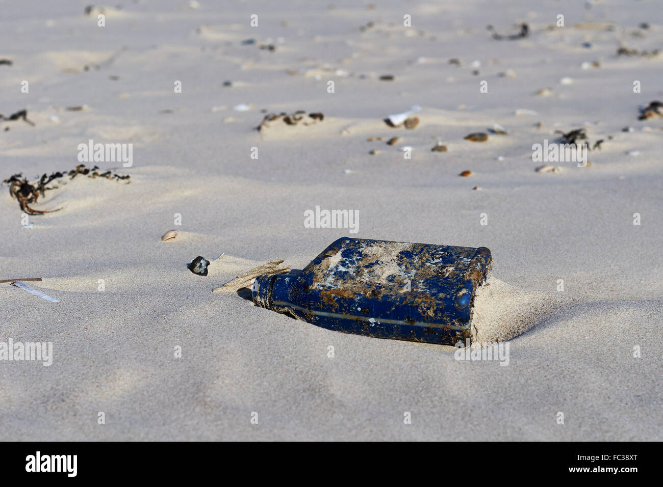 Flotsam: Plastic Oil Bottle Stock Photo