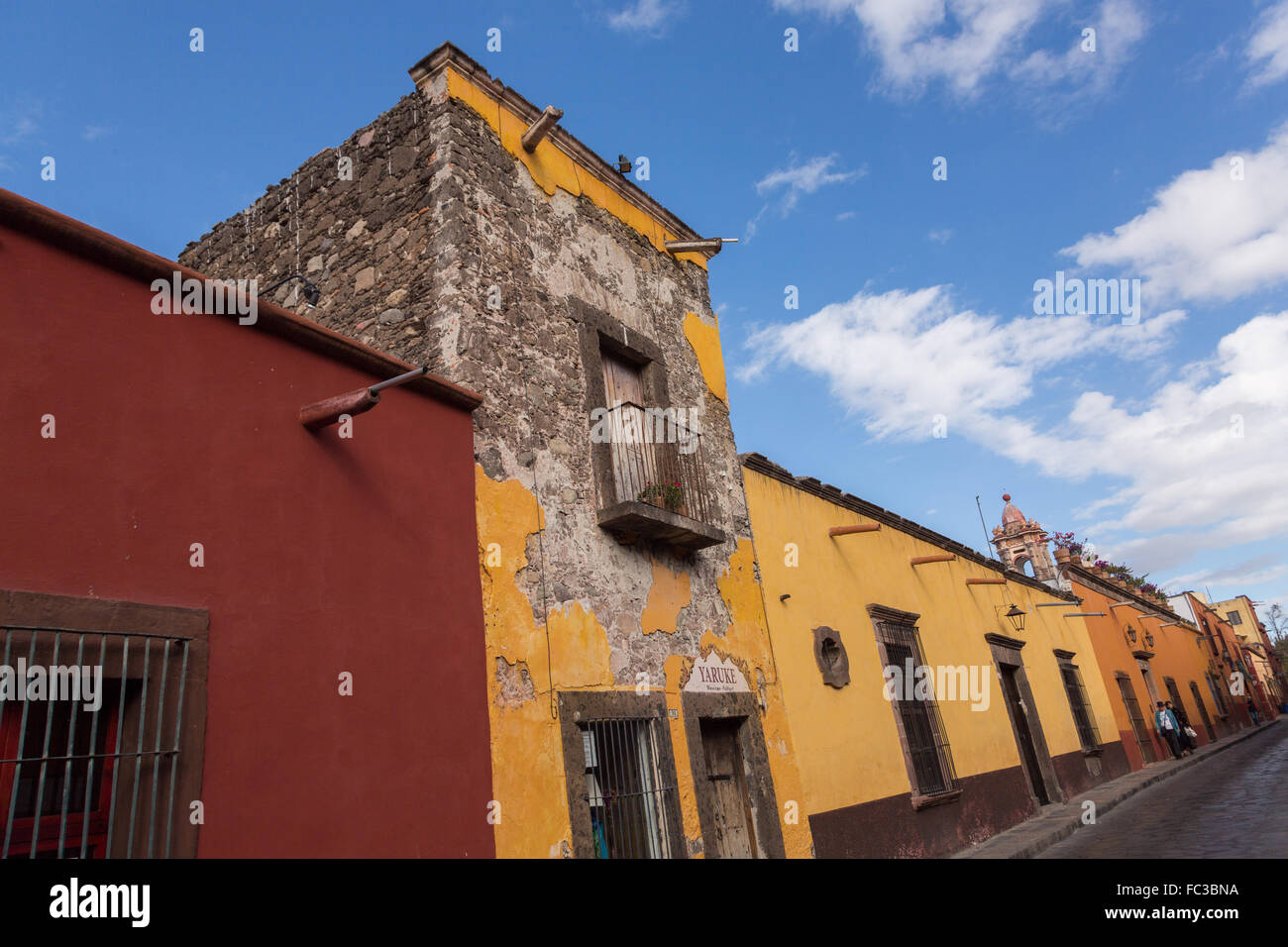 Old abobe style building along Hernandez Macias street in San Miguel de Allende, Mexico. Stock Photo