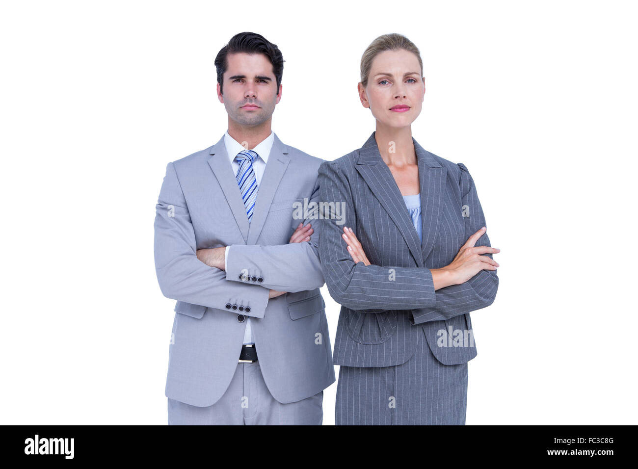 Business people with arms crossed looking at camera Stock Photo - Alamy