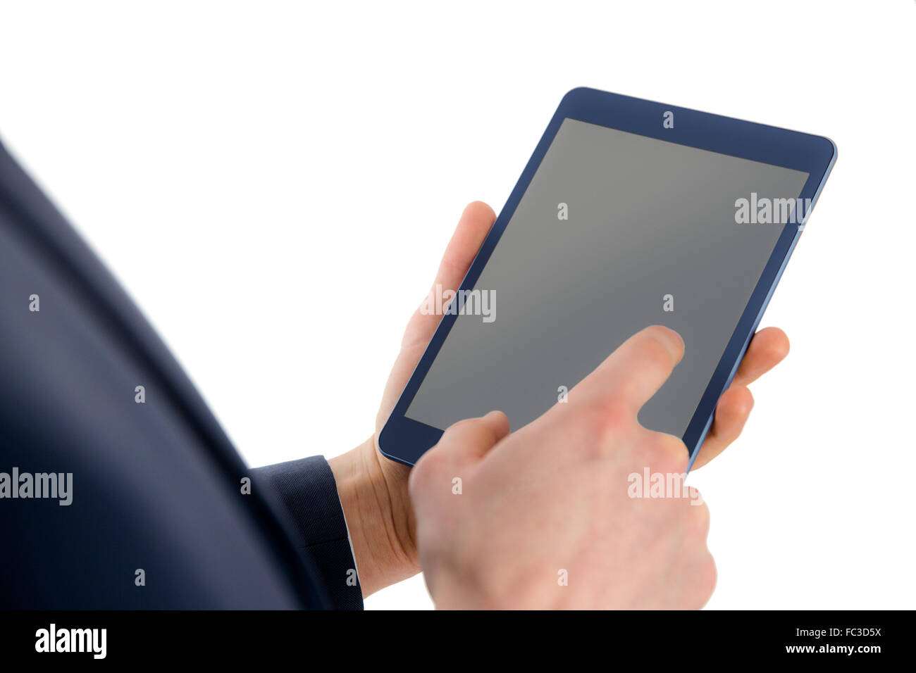 Close up view of businessman using tablet computer Stock Photo