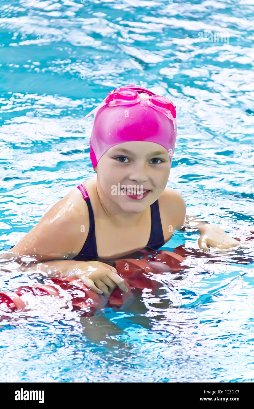 Cute girl in swimming pool Stock Photo - Alamy