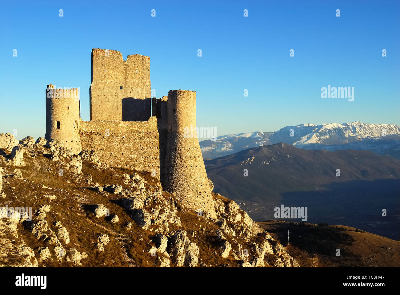 Rocca Calascio is a mountaintop fortress or rocca in the Province of L'Aquila in Abruzzo, Italy. At an elevation of 1,460 metres (4,790 ft), Rocca Calascio is the highest fortress in the Apennines.  Rocca Calascio was the location for the final scene of Richard Donner film Ladyhawke.  Sequences for The Name of the Rose and The American were also shot here. Stock Photo