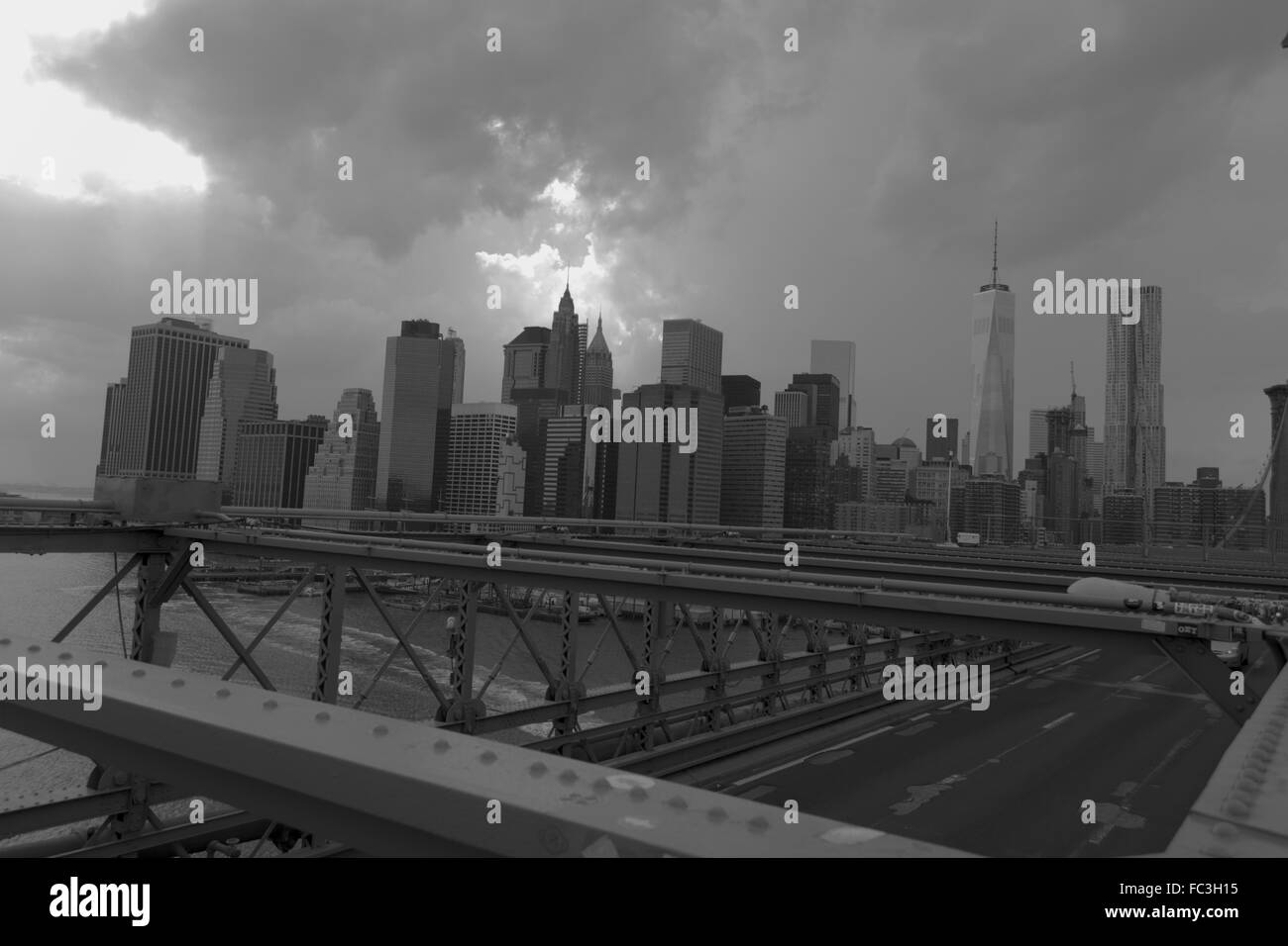 Crossing the Brooklyn bridge in the storm Stock Photo
