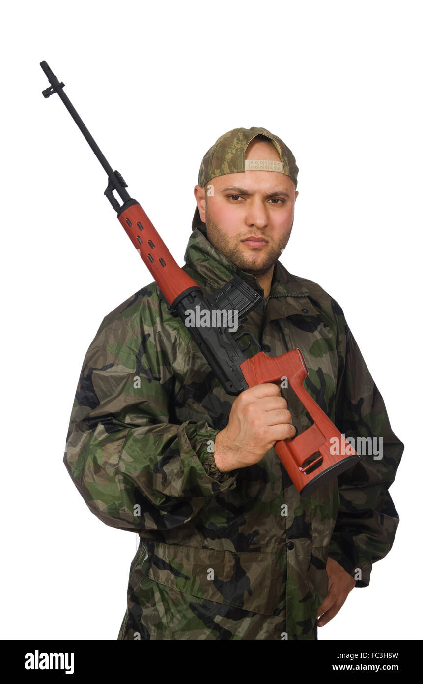 Young man in soldier uniform holding gun isolated on white Stock Photo