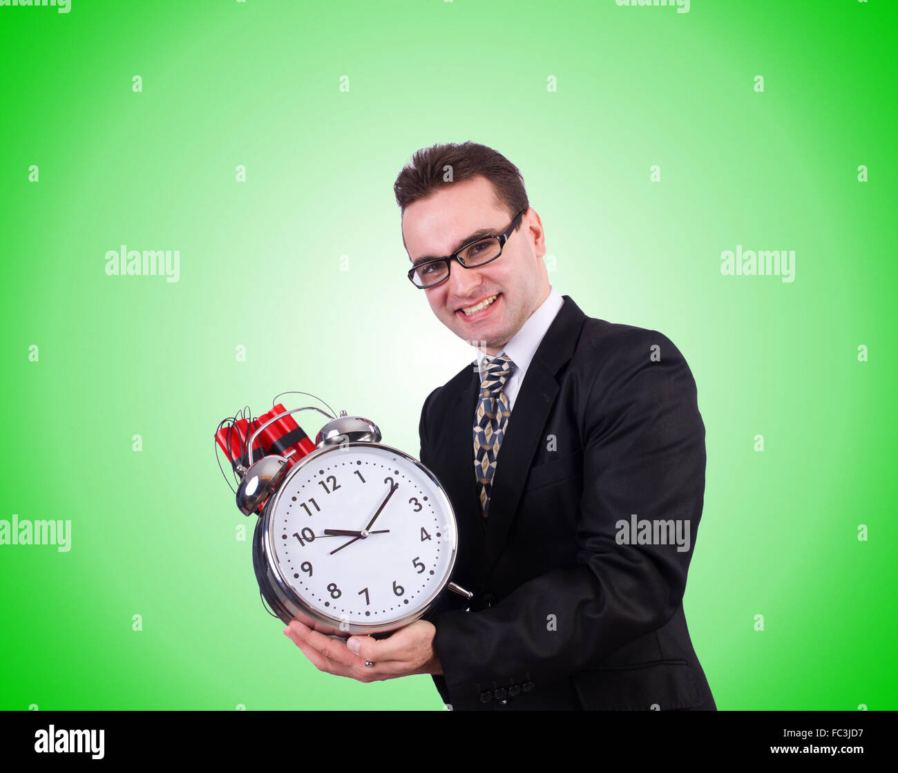 Man with time bomb isolated on white Stock Photo