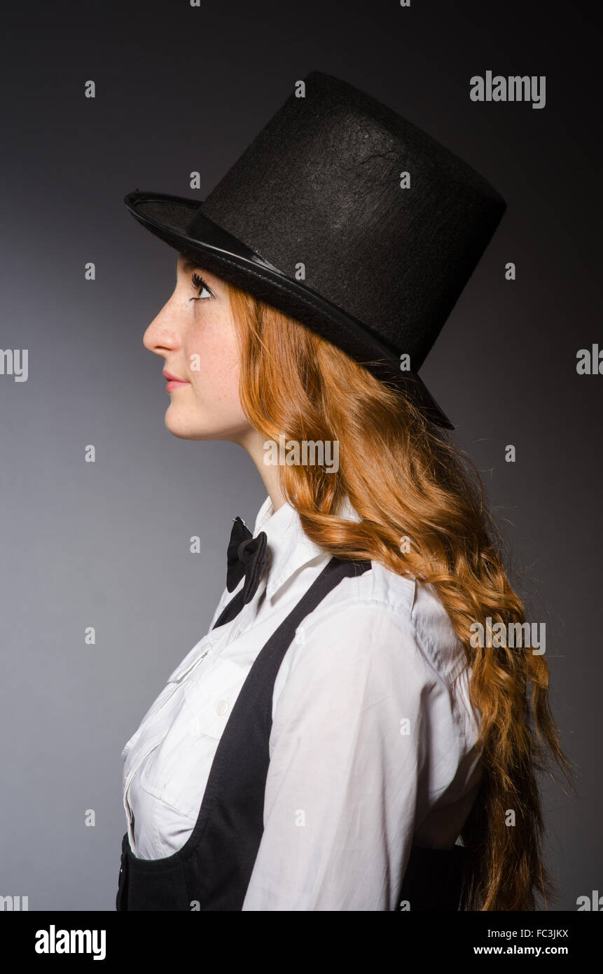 Pretty girl wearing retro hat isolated on gray Stock Photo - Alamy