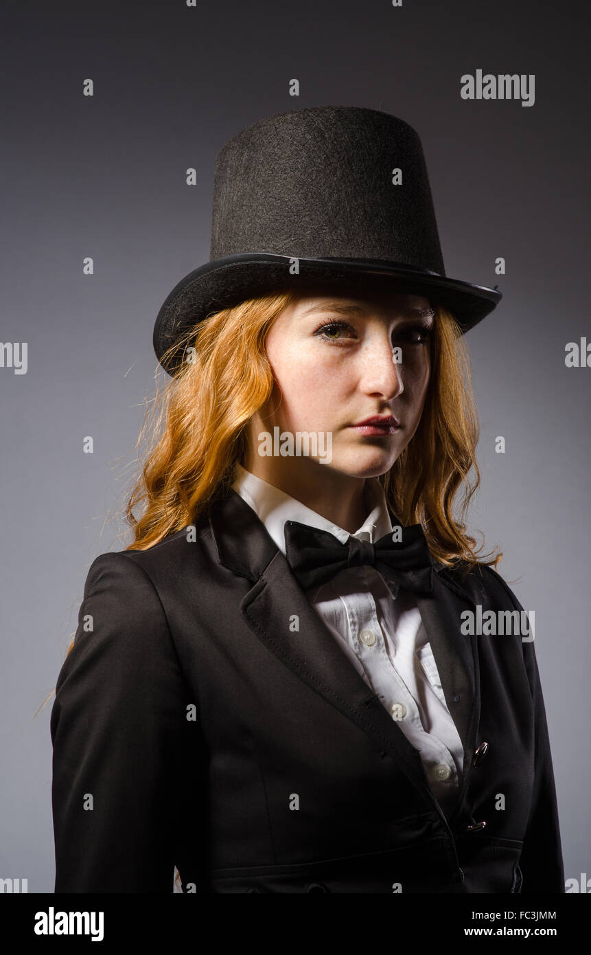 Pretty girl wearing retro hat isolated on gray Stock Photo - Alamy