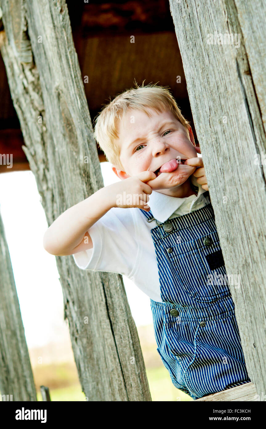 boy sticking out his tongue Stock Photo