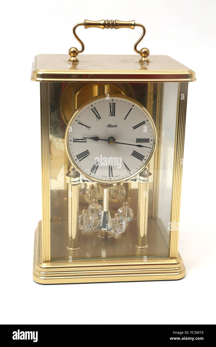 Mantel Clock With Roman Numerals And Crystal Pendulums Stock Photo Alamy