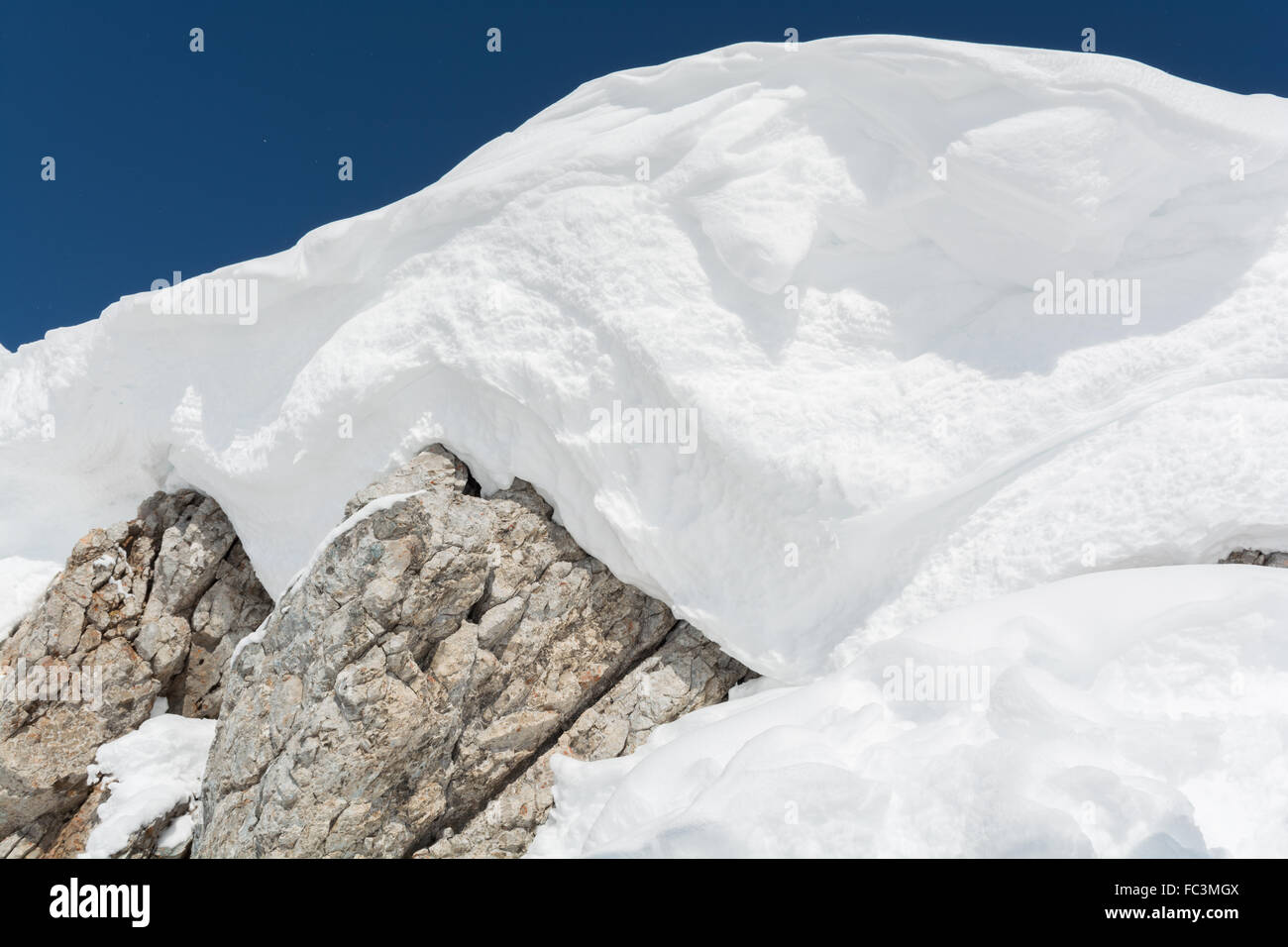 In snow-clad peak of the Alps Stock Photo