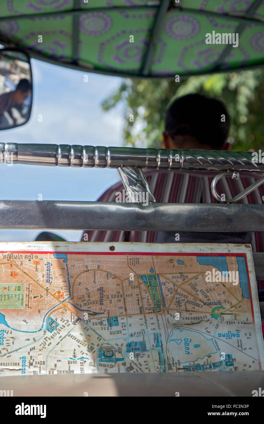 Mapguide Backseat Driver driver of mototaxi with the city map on seat Stock Photo - Alamy