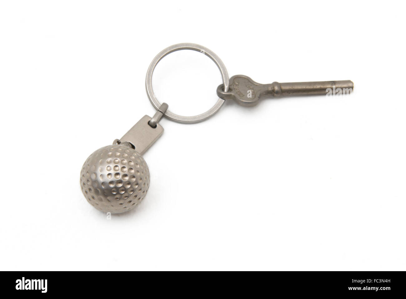 Golf Ball Keyring With Key Stock Photo Alamy