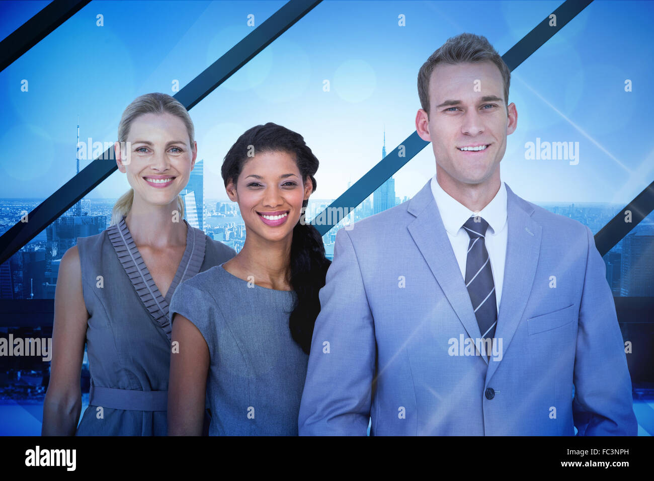 Composite image of happy business team smiling at camera Stock Photo ...