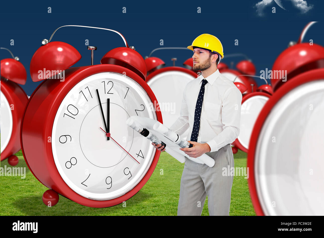 Composite image of thoughtful young architect posing Stock Photo
