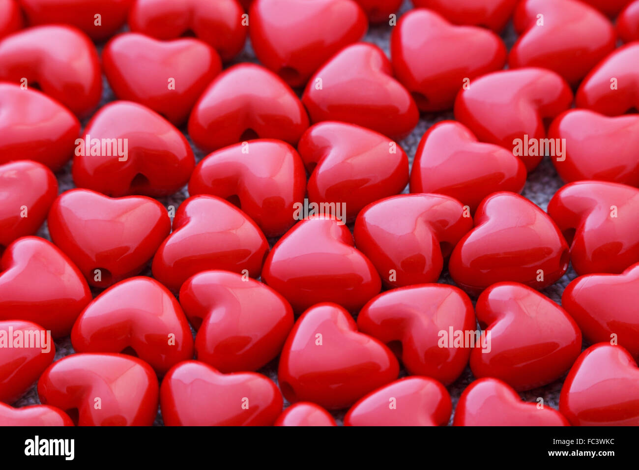 close up of red heart shaped beads Stock Photo