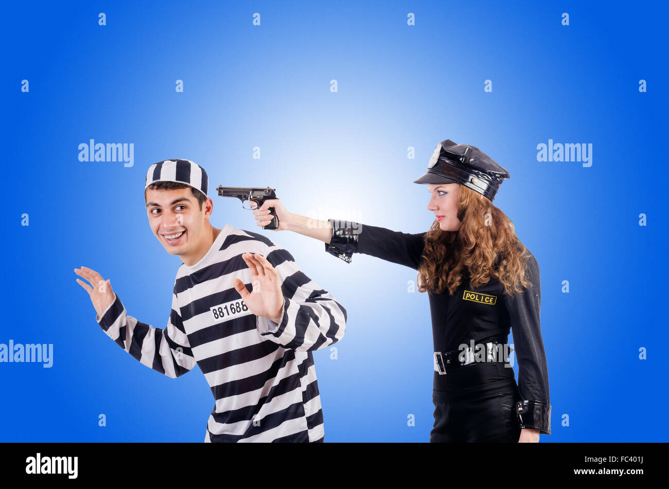 Police and prison inmate against the gradient Stock Photo