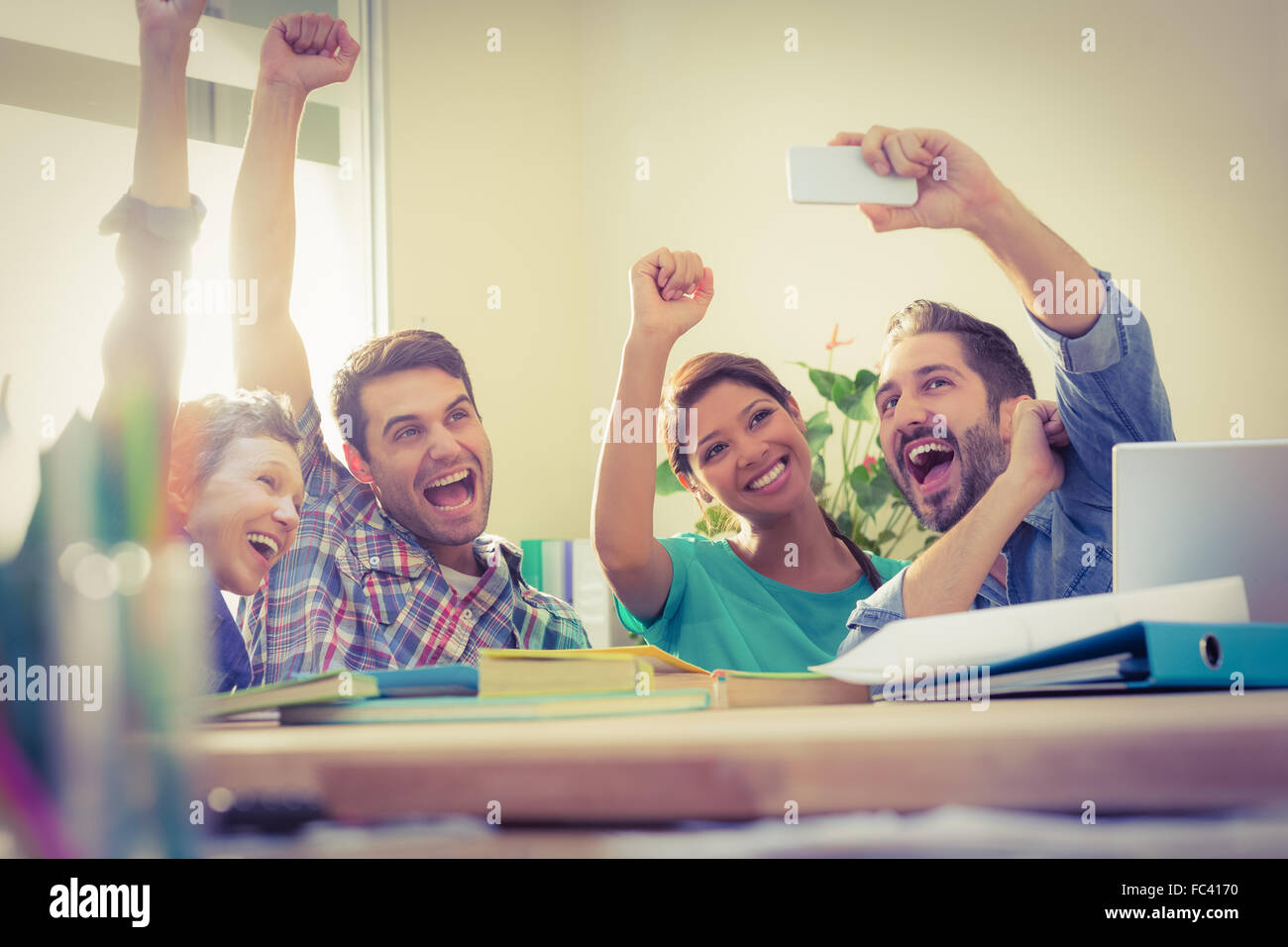 Group of colleagues taking a selfie Stock Photo
