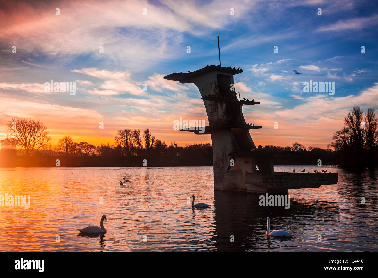 The old diving board at Coate Water in Swindon at dawn Stock Photo Alamy