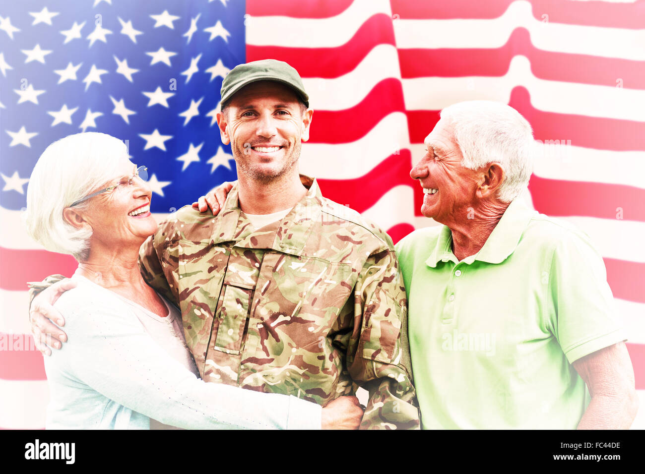 Composite image of soldier reunited with parents Stock Photo