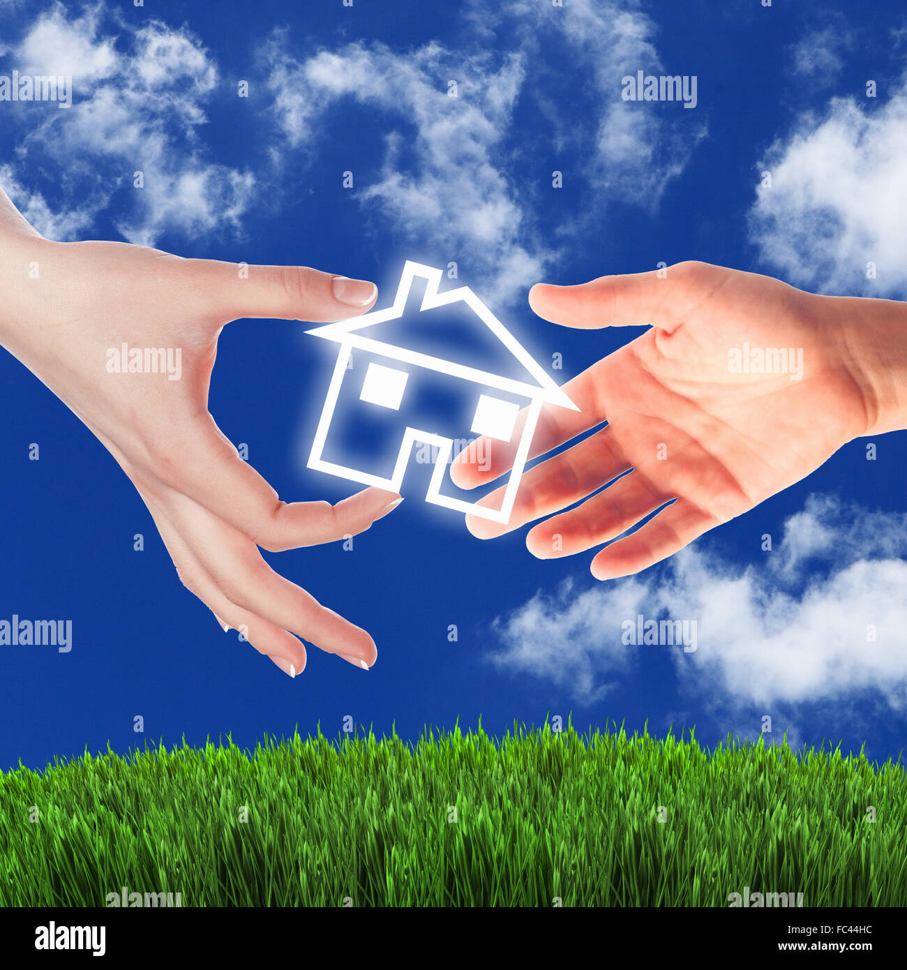 Human hand against blue sky background and house Stock Photo - Alamy
