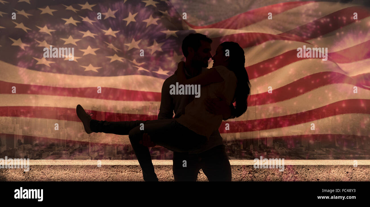 Composite image of attractive young couple having fun Stock Photo - Alamy