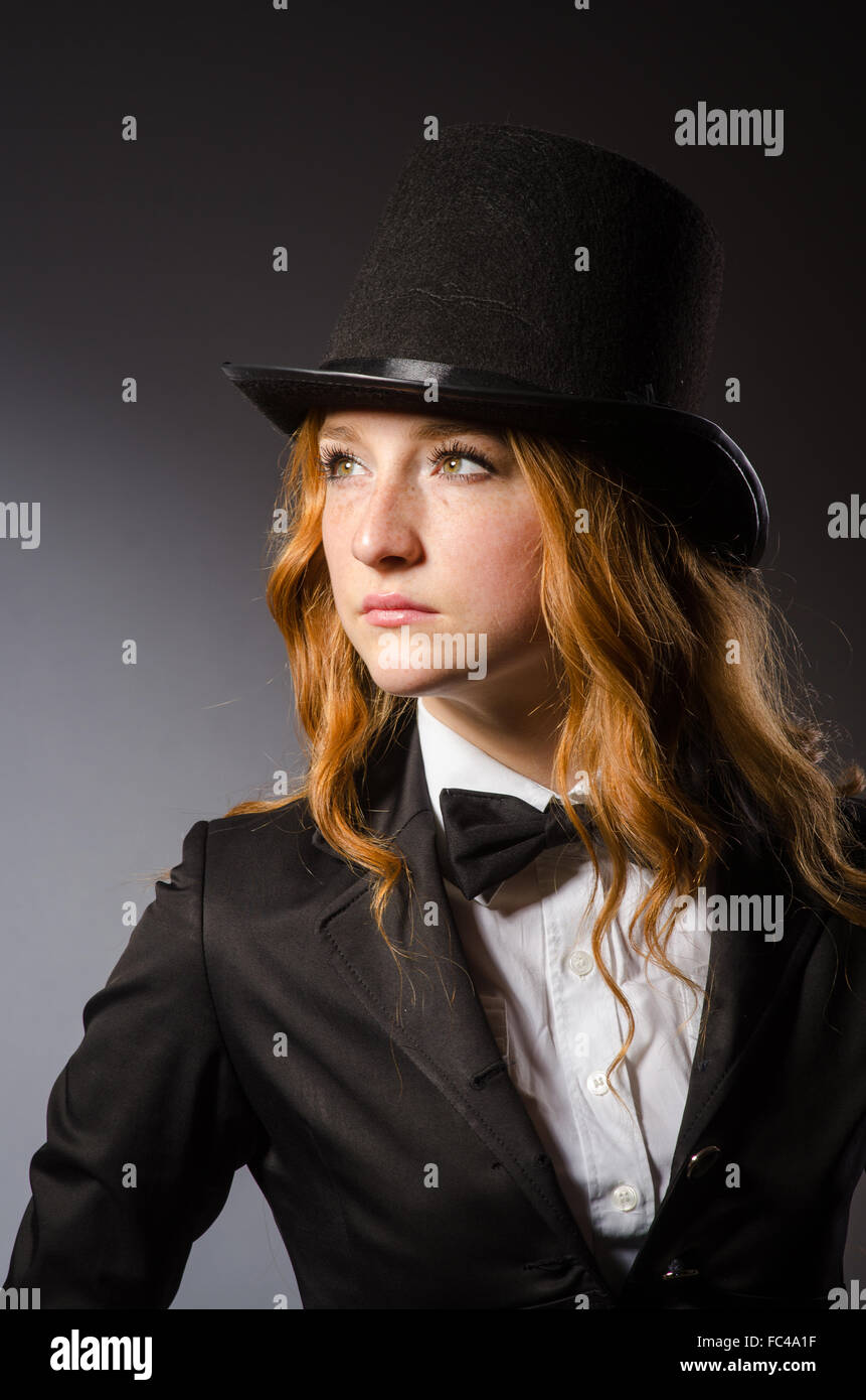 Pretty girl wearing retro hat isolated on gray Stock Photo - Alamy