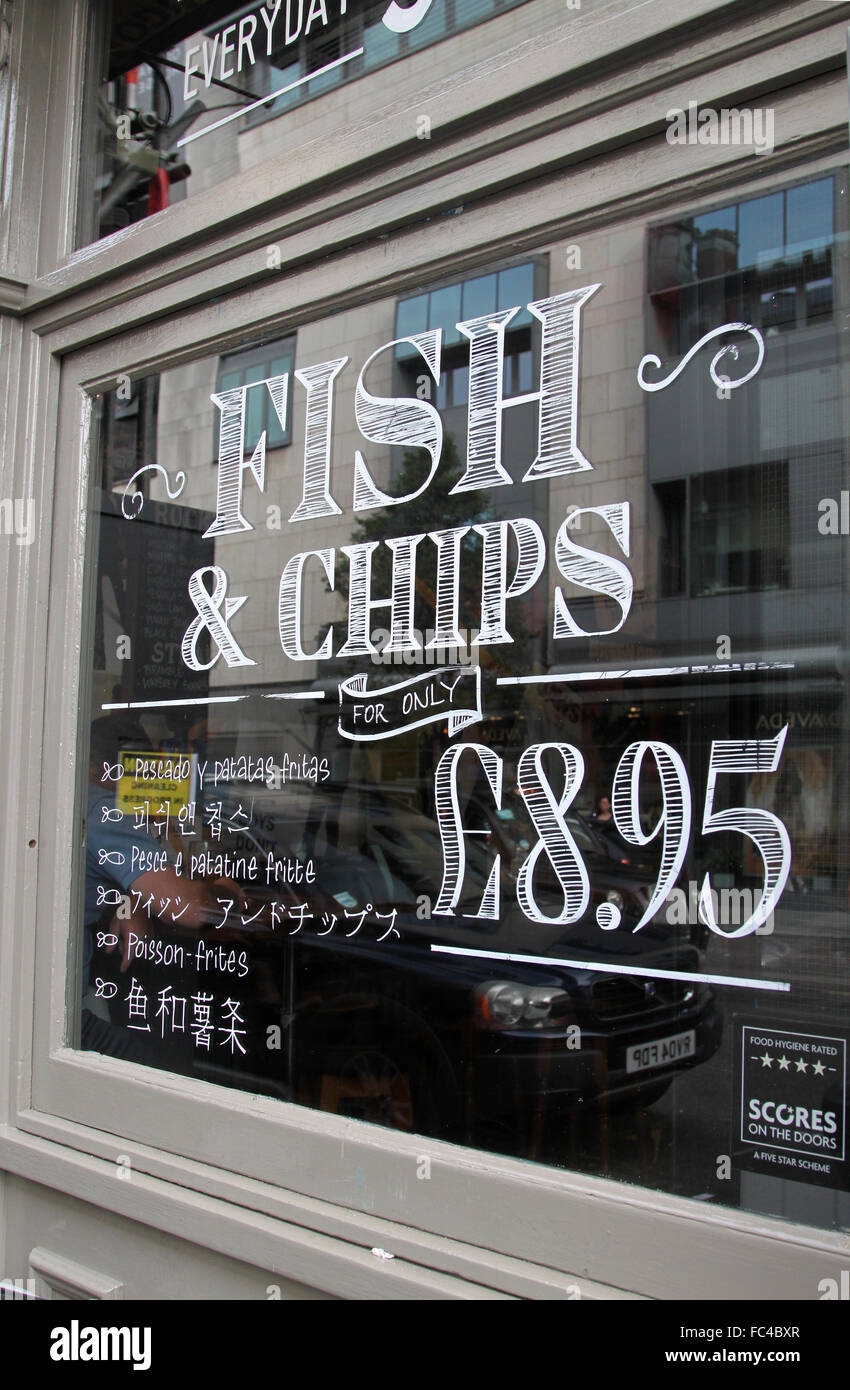 Fish Chips Sign On Restaurant Window In Covent Garden London