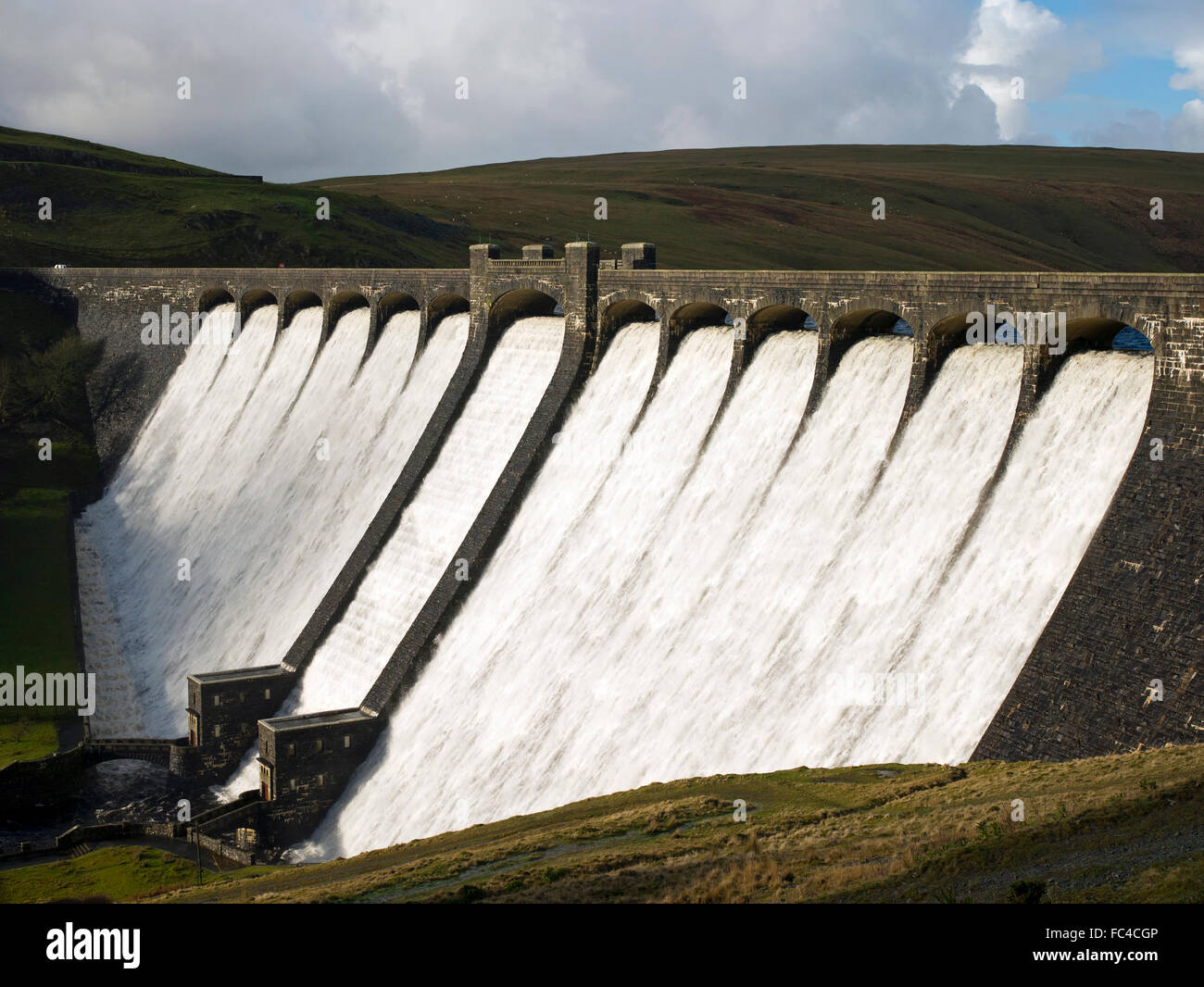 Claerwen reservoir dam overflowing, Elan Valley, Wales UK. Stock Photo