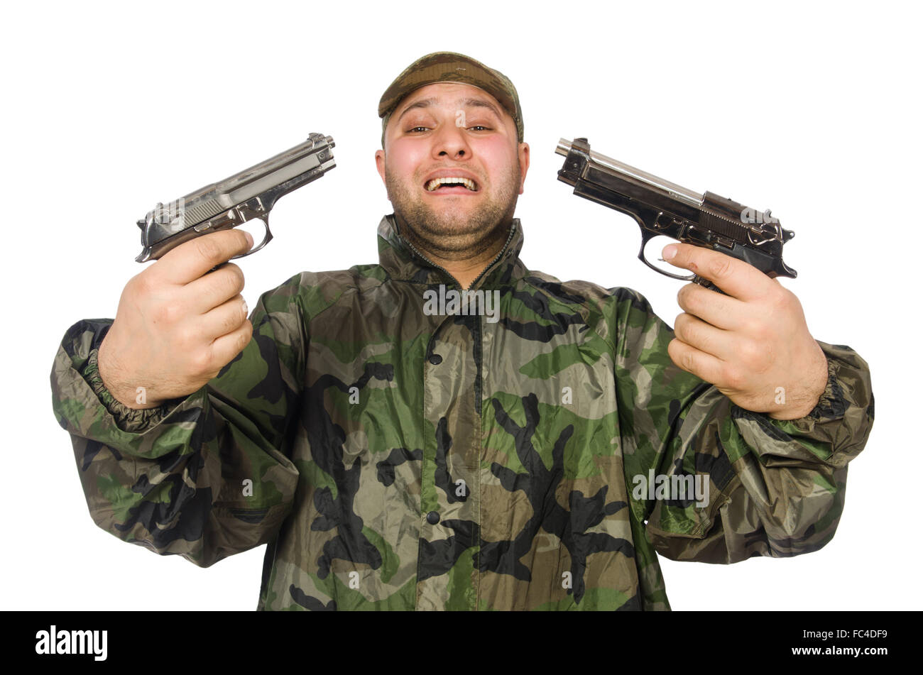 Young man in soldier uniform holding gun isolated on white Stock Photo