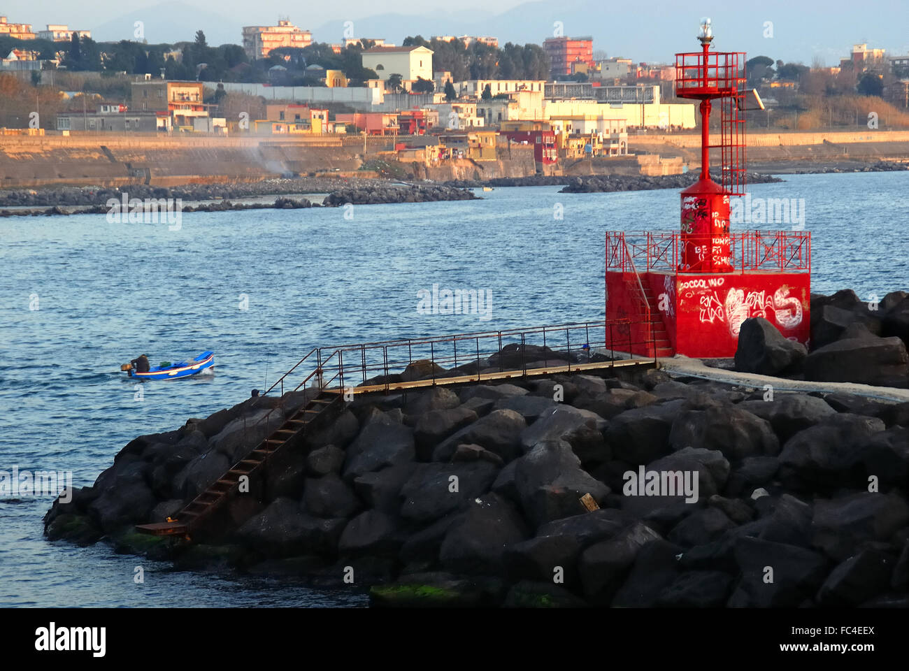 Torre del Greco, Campania, italy. The lighthouse at the harbor entrance. Stock Photo